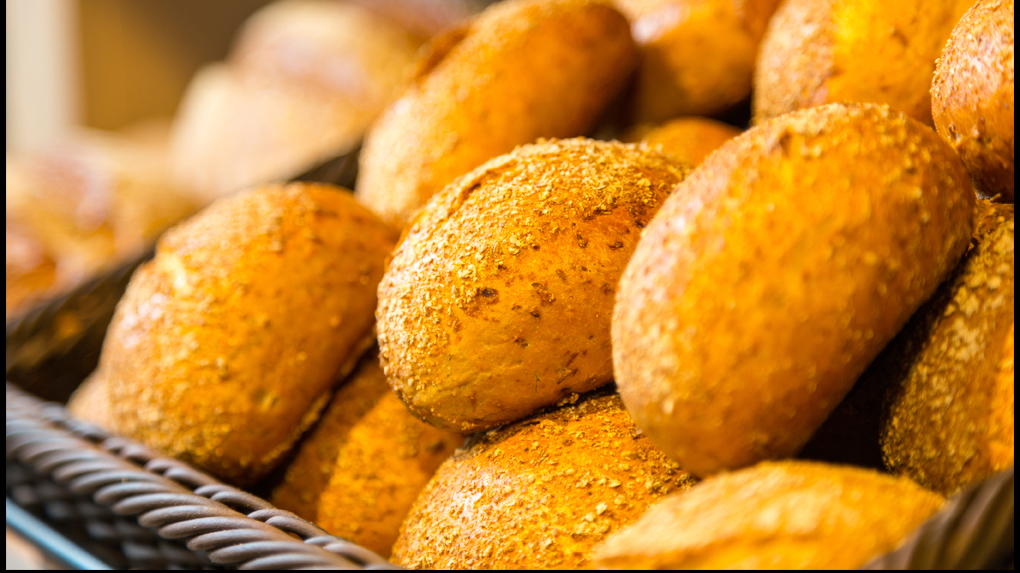 Fresh buns and rolls on the shelf at Specialty Bakery